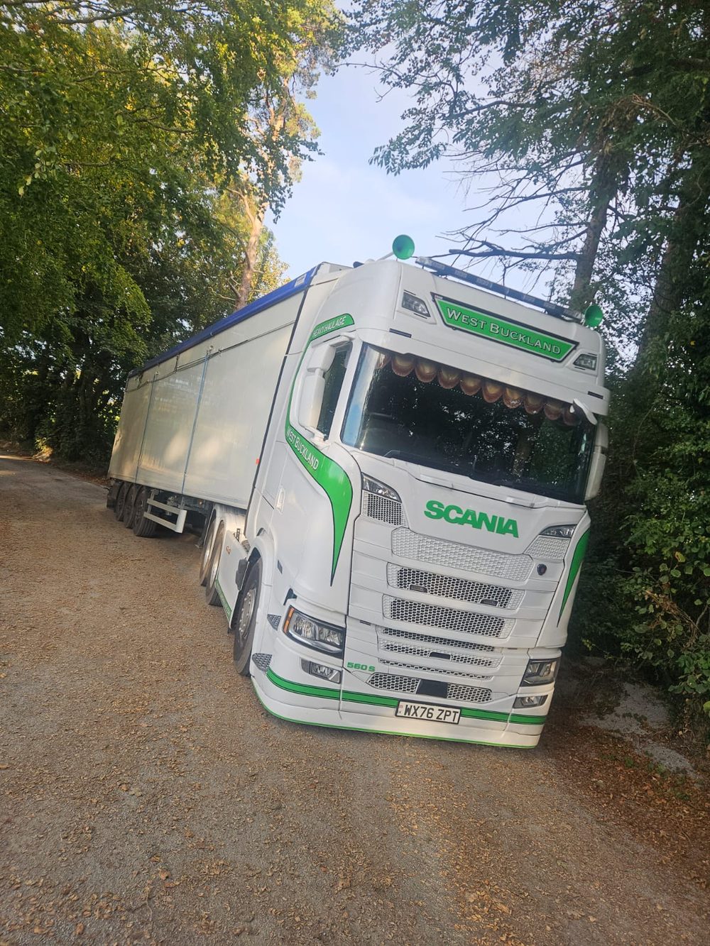 A West Buckland Haulage walking floor lorry squeezing down a narrow Somerset lane